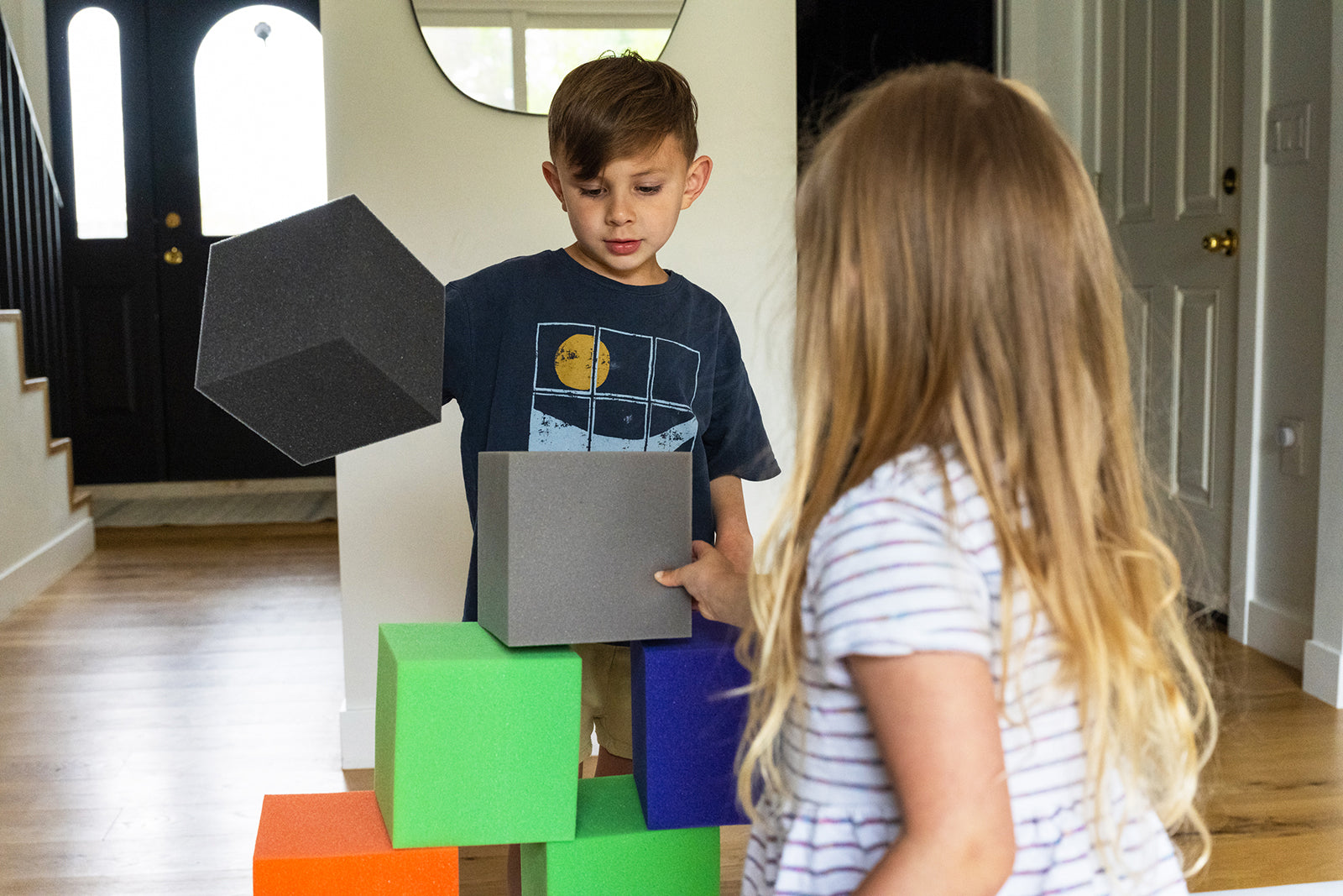 kids playing with foam blocks