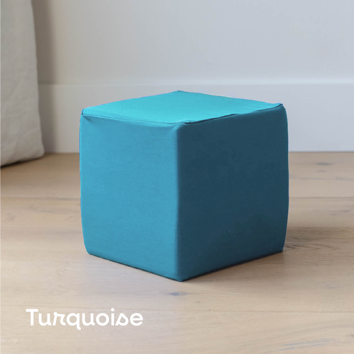 Turquoise covered cube