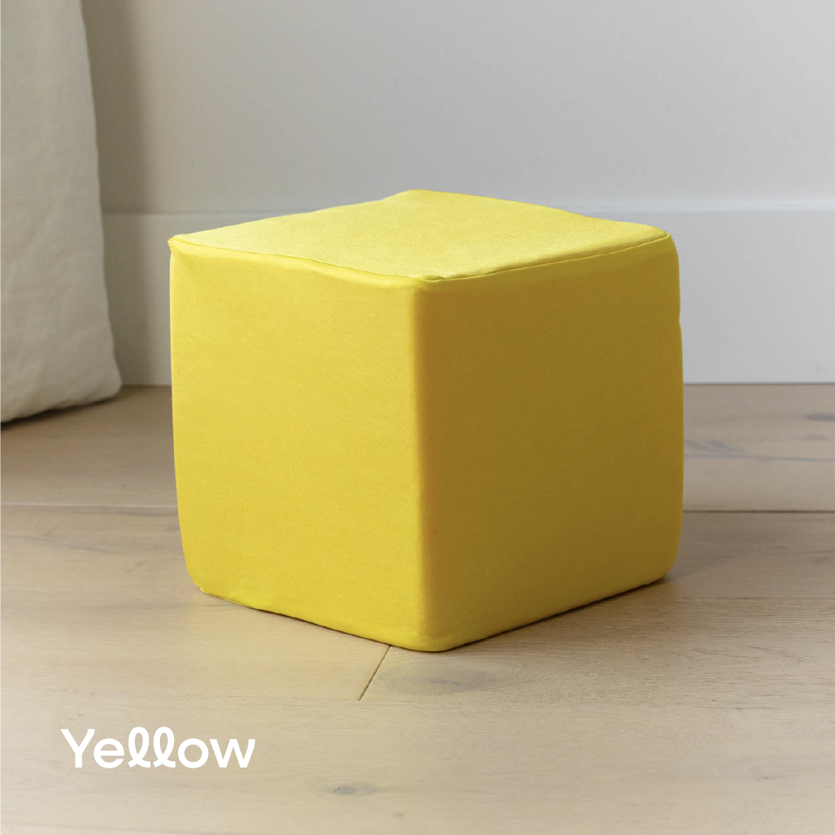 Yellow cube cover on foam cube